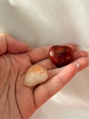 2 crystal heart carvings